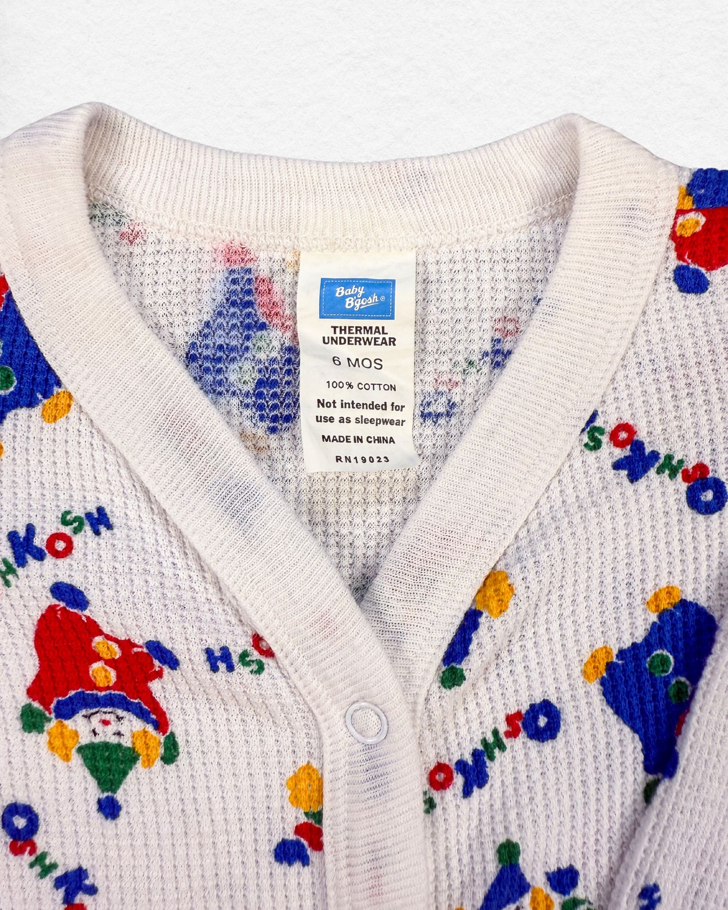 OshKosh Clown Print Onesie – 6M